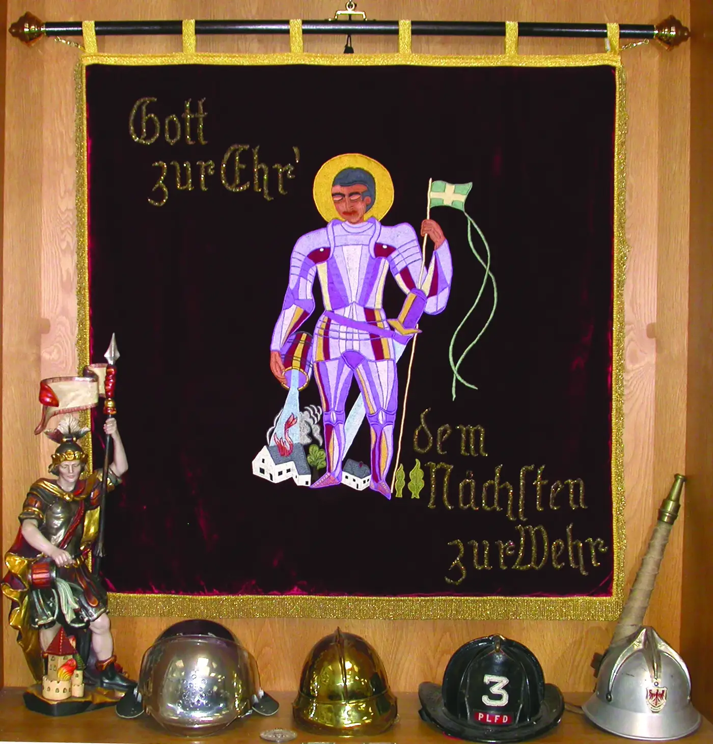 Die historische Fahne der Wehr: „Gott zur Ehr, dem Nächsten zur Wehr“